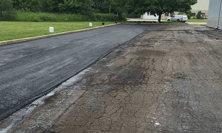 new asphalt next to old asphalt