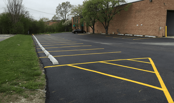 new asphalt and parking lot markings