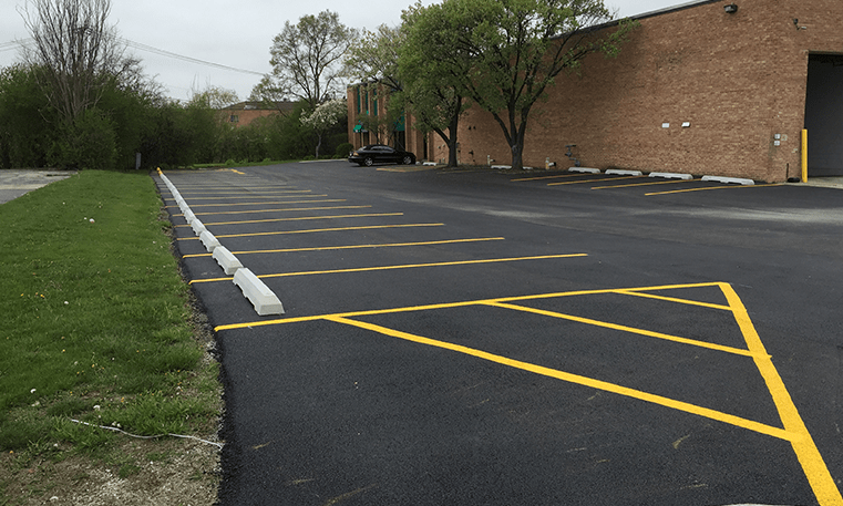 new asphalt and parking lot markings