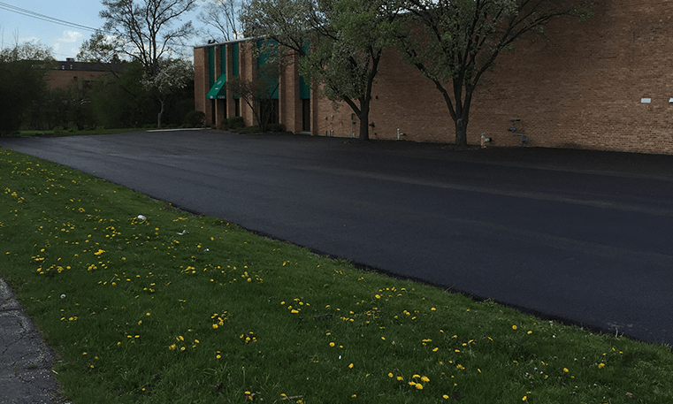 new asphalt overlay parking lot