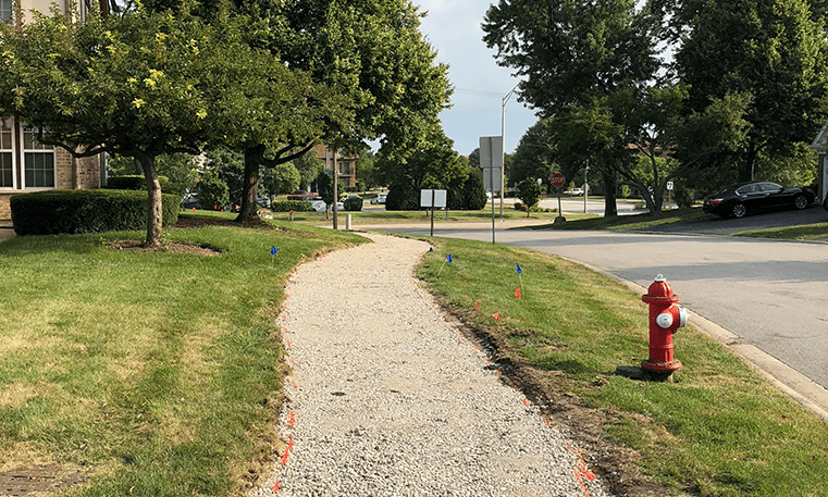 sidewalk before asphalt