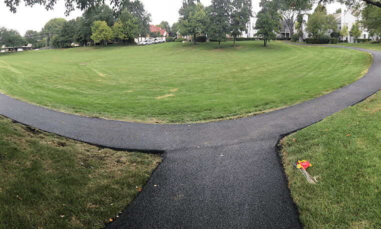 asphalt turn on sidewalk