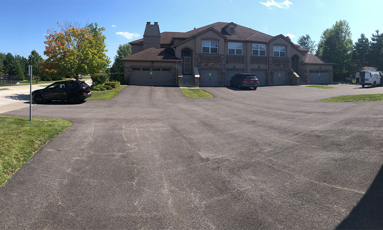 driveway before asphalt replacement