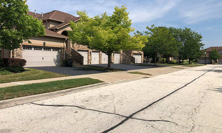 home driveway after asphalt replacement