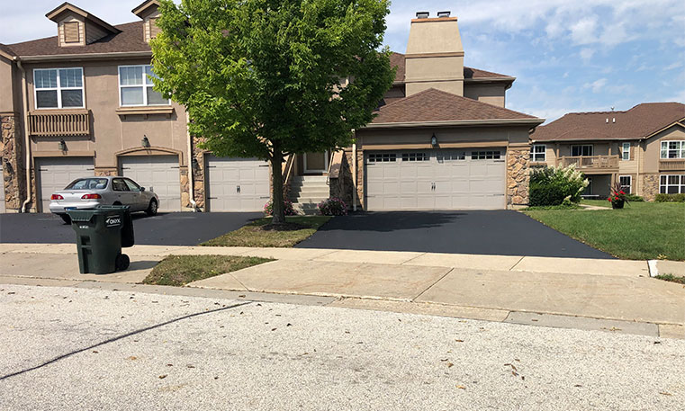 home driveway after asphalt replacement