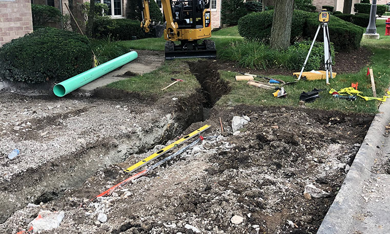 driveway concrete undergoing removal and replacement