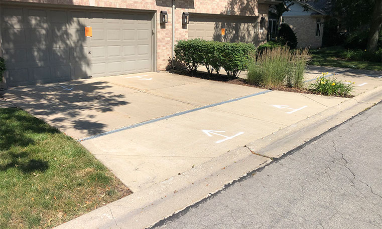 driveway of home before concrete replacement