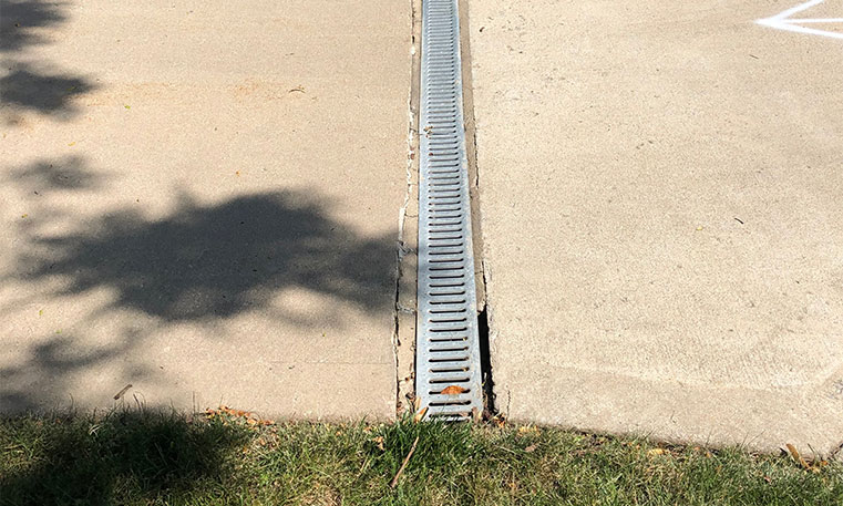 drain on damaged concrete