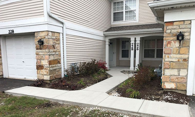 renovated sidewalk in front of home