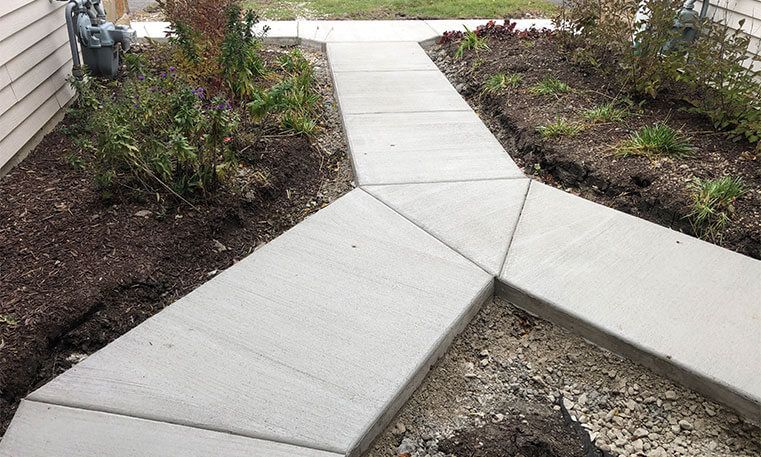 renovated sidewalk in front of home