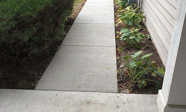 updated sidewalk concrete in front of home