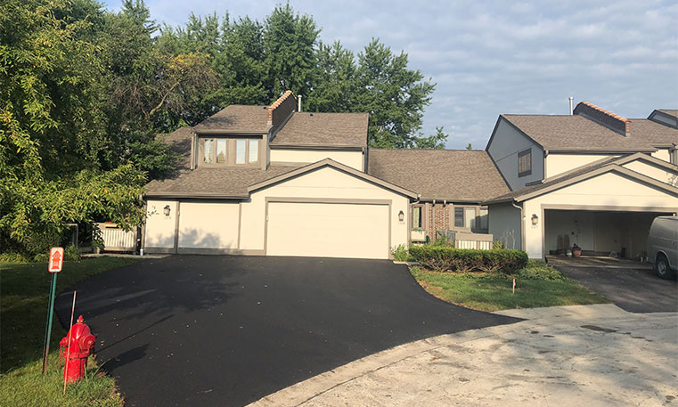 asphalt driveway after replacement