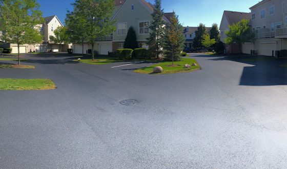 finished asphalt driveway and street at townhome assocation