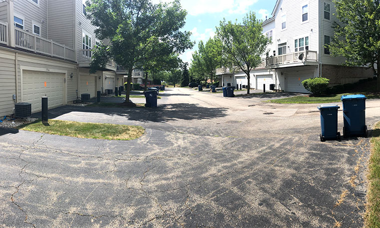 townhome driveway prior to asphalt replacement