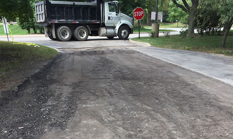 damaged parking lot surface