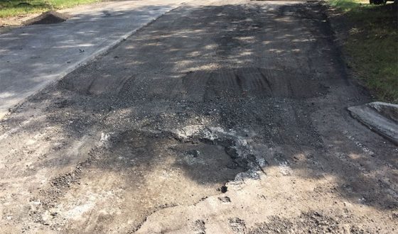 damaged concrete surface in parking lot