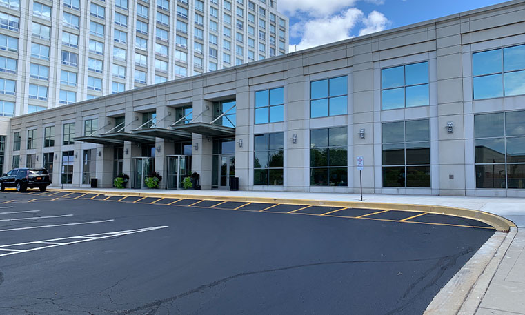 asphalt parking lot in front of the westin hotel