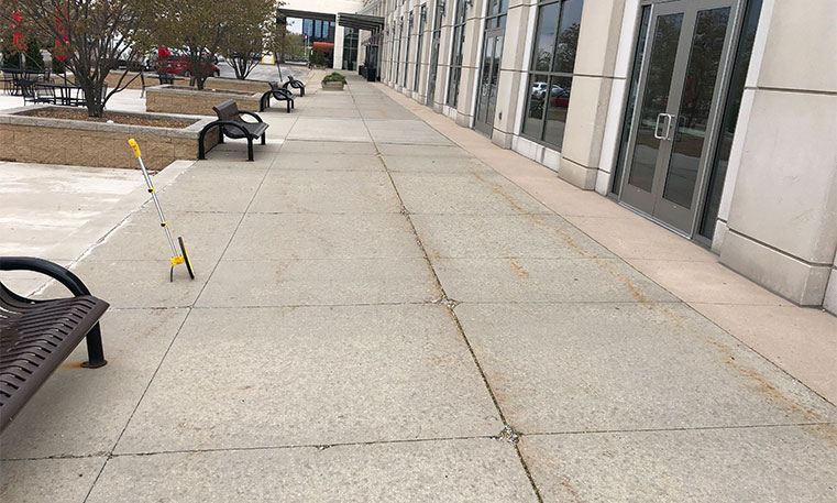 damaged sidewalk in front of the westin hotel