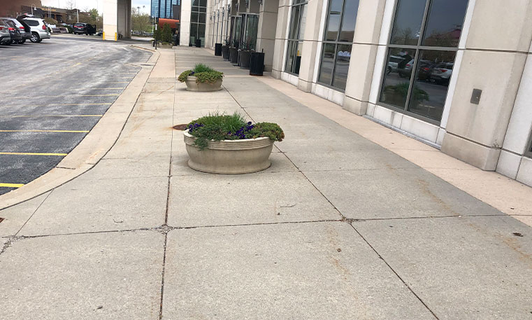 damaged sidewalk leading to the westin hotel