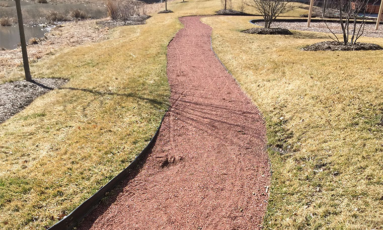 damaged walkway outside of condo buildings