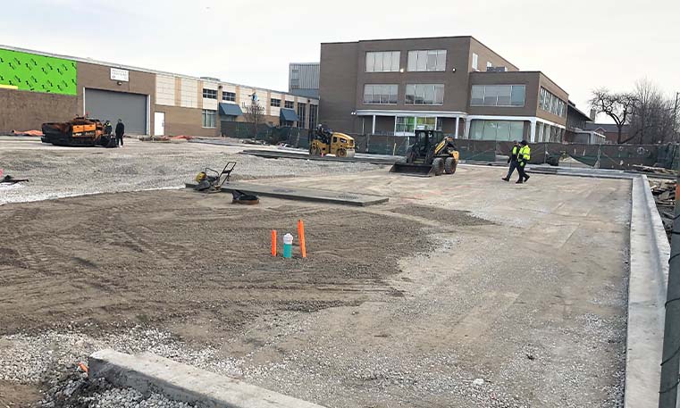 beginning of stoning and compaction with asphalt at Bradley Place