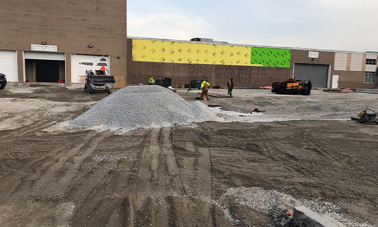 beginning of stoning and compaction with asphalt at Bradley Place