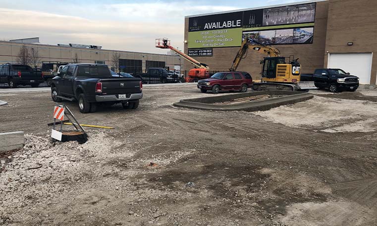 beginning of stoning and compaction with asphalt at Bradley Place