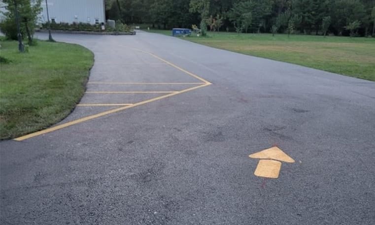 close-up of parking lot arrow